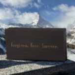 Modern Black Tan Forgiven. Free. Forever. Name Wooden Box Sign<br><div class="desc">You can personalize this with a name or date at the bottom if you desire. This modern stylish Christian faith quote is written in tan golden typography. This inspirational spiritual quote refers to the forgiveness and freedom we have through faith in Jesus Christ. This tan on black "forgiven. free. forever."...</div>
