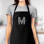 Modern Black White Monogram Initial Name Apron<br><div class="desc">Personalized Custom Create Your Own Modern Black White Initial Name Monogram Apron. This stylish and versatile apron is perfect for anyone who wants to add a personalized touch to their work attire. Whether you're a home chef creating culinary masterpieces in the kitchen, a hair stylist looking for a chic yet...</div>
