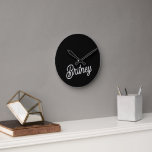 Modern Black White Personalized Monogram and Name Round Clock<br><div class="desc">The Modern Black White Personalized Monogram and Name Clock would be a chic and functional addition to any room. The elegant black and white design, featuring personalized details, adds a touch of sophistication while providing a practical timekeeping solution. It’s perfect for enhancing your home decor or as a thoughtful gift....</div>