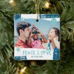 Modern blue peace love beach Christmas photo Ceramic Ornament<br><div class="desc">Modern coastal seaside blue peace love beach Christmas photo with hand lettered rope pattern,  anchor ,  clam and star fish. Spending the holidays on the beach in the South Hemisphere! With turquoise and navy blue editable colours and brushstroke overlay photo.</div>
