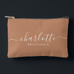 Modern Bridesmaid Gift Caramel Favour  Accessory Pouch<br><div class="desc">This Bridesmaid accessory bag features a handwritten white script typography with swashes on a caramel background. Present your bridesmaids with a toiletry bag for their makeup and small items traditionally presented at the rehearsal dinner,  for use in the early morning before the wedding.</div>