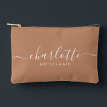 Modern Bridesmaid Gift Caramel Favour  Accessory Pouch<br><div class="desc">This Bridesmaid accessory bag features a handwritten white script typography with swashes on a caramel background. Present your bridesmaids with a toiletry bag for their makeup and small items traditionally presented at the rehearsal dinner,  for use in the early morning before the wedding.</div>