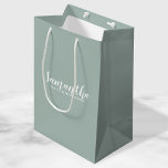 Modern Bridesmaid Proposal Medium Gift Bag<br><div class="desc">Modern Bridesmaid Proposal Gift Bag
featuring personalized bridesmaid's name in white modern script font style with text in modern sans serif font style on sage green background.

Also perfect for maid of honour,  flower girl and more.</div>