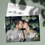 Modern Brushed Script Photo Save The Date Announcement Postcard<br><div class="desc">Elegant and modern save the date postcard featuring a white modern hand-lettered script font overlay. Personalize the modern save the date cards by adding your names,  wedding details,  and favourite engagement photo. The photo used in this design is for display purposes only and is not for resale.</div>