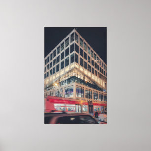 Modern Building at Night with Traffic Canvas Print