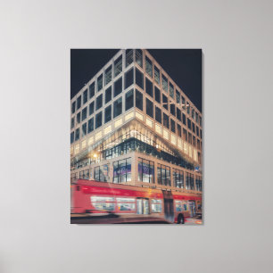 Modern Building at Night with Traffic Canvas Print