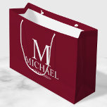 Modern Burgundy and White Personalized Groomsman Large Gift Bag<br><div class="desc">Modern Personalized Groomsman Gifts
featuring personalized monogram,  groomsman's name and title in white classic serif font style on burgundy red background.

Also perfect for best man,  father of the bride,  ring bearer and more.</div>
