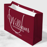 Modern Burgundy Red Personalized Groomsman Large Gift Bag<br><div class="desc">Personalized Groomsman Gifts
featuring personalized groomsman's name in white modern script font style with title and wedding date in modern sans serif font style on burgundy red background.

Also perfect for best man,  father of the bride,  bridesmaid,  maid of honour,  mother of the bride and more.</div>