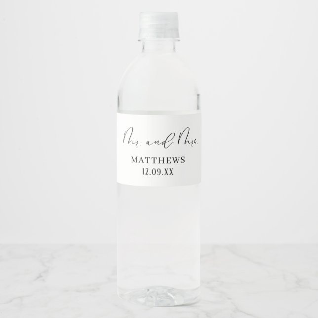 Modern chic black calligraphy script Mr and mrs  Water Bottle Label (Front)