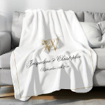 Modern Chic Custom Newlywed Keepsake Monogram Fleece Blanket<br><div class="desc">Modern Chic White Personalized Newlywed Keepsake Monogram Fleece Blanket. Personalized white and gold monogrammed Fleece Blanket. Classic script for the initial, the names of the bride and groom, and the wedding date on a simple elegant white background. Perfect gift for newlyweds, and engaged couples, a cherished reminder of their special...</div>