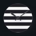 Modern Chic Elegant Black and White Striped Round Clock<br><div class="desc">Modern Chic Elegant Black and White Striped Round Clock. Fast shipping Worldwide. Own this elegant modern chic trendy Black and White Striped Clock Now! Beautiful addition to any Home and makes a wonderful Gift as well. Modern Chic Elegant Black and White Striped Round Clock. Created by Artist RjFxx *All rights...</div>