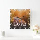 Modern Chic Wedding All you need is Love Photo Square Wall Clock<br><div class="desc">Forget the cliché chocolates, honey! Spice up your Valentine's with a clock that sings "All You Need is Love" in modern style! Picture your dreamy wedding pic surrounded by sleek lines and cool fonts, whispering sweet nothings every hour. It's a love story frozen in time, adorning your wall instead of...</div>
