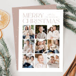 Modern Christmas 9 Photo Collage Holiday Card<br><div class="desc">Modern Christmas photo card featuring "Merry Christmas" displayed at the top of the design in trendy light mauve lettering with a white background. A photo collage of 9 photos is shown below in a grid-style layout. Personalize the multi-photo Christmas card with your family name. The card reverses to display a...</div>