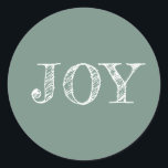 Modern Christmas Holiday Joy Dusty Green Classic Round Sticker<br><div class="desc">Modern Christmas sticker with the text JOY in white elegant script typography on a dusty green background. Exclusively designed for you by Happy Dolphin Studio. If you need any help or matching products please contact us via our store chat!</div>