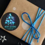 Modern Christmas Tree Blue Stars Lights on Black  Classic Round Sticker<br><div class="desc">Add a touch of holiday magic to your gifts with this customizable Christmas sticker! It features a radiant Christmas tree, crafted from blue and green stars, twinkling against a sleek black background. The words "Merry Christmas" are elegantly inscribed in blue, adding a personal touch. This sticker is perfect for spreading...</div>