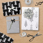 Modern Christmas Trees Black Silver Grey Pattern Wrapping Paper Sheet<br><div class="desc">A collection of coordinated giftwrap sheets featuring modern abstract Christmas and forest trees and winter snow patterns in colours of silver, grey, black and white. Contact the designer BEFORE ORDERING via Zazzle Chat or makeitaboutyoustore@gmail.com for design modifications, assistance with personalizing or transferring the design to another product or would like...</div>