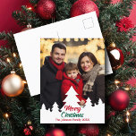 Modern Christmas Trees Family Photo Red Green Holiday Postcard<br><div class="desc">This chic,  modern family photo Christmas postcard features your vertical holiday photograph framed by a bottom border of white Christmas trees silhouette. Personalize with red and green script for a beautiful minimalist photograph Christmas postcard.</div>