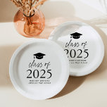 Modern Class of 2025 Black Script Graduation Paper Plate<br><div class="desc">Add a personalized touch to your graduation party with these modern graduation paper plates! The paper plates feature a black graduation cap at the top of the design with "Class of 2025" displayed in bold black lettering. Personalize the black and white graduation plates with the graduate's name, school, and graduation...</div>