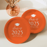 Modern Class of 2025 Script Orange Graduation Paper Plate<br><div class="desc">Add a personalized touch to your graduation party with these modern graduation paper plates! The paper plates feature a graduation cap at the top of the design with "Class of 2025" displayed in bold white lettering on an orange background. Personalize the orange graduation plates with the graduate's name, school, and...</div>