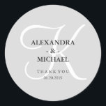 Modern Classic Grey Monogram and Thank You Classic Round Sticker<br><div class="desc">These stylish wedding stickers have a soft grey background,  and a large white calligraphy monogram.</div>