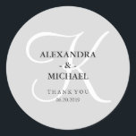 Modern Classic Grey Monogram and Thank You Classic Round Sticker<br><div class="desc">These stylish wedding stickers have a soft grey background, and a large white calligraphy monogram.</div>