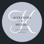 Modern Classic Monogram | Dusty Blue Thank You Classic Round Sticker<br><div class="desc">These stylish wedding stickers have a dusty blue background,  and a large white calligraphy monogram.</div>