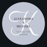 Modern Classic Monogram | Dusty Blue Thank You Round Sticker<br><div class="desc">These stylish wedding stickers have a dusty blue background,  and a large white calligraphy monogram.</div>