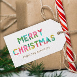 Modern Colourful Merry Christmas Name Gift Tags<br><div class="desc">These fun,  colourful gift tags feature modern typography reading,  "MERRY CHRISTMAS, " designed with overlapping tissue paper in bold colours of red,  green,  golden yellow,  lime,  aqua,  and magenta pink. The back contains a matching pattern of overlapping Christmas trees.</div>