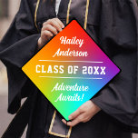 Modern Colourful Rainbow Adventure Awaits Graduation Cap Topper<br><div class="desc">This graduation cap topper features a colourful rainbow hued background, simple typography, and modern calligraphy script. The topper has your graduate's name, class of (year), and the phrase "Adventure Awaits". All of the these can be edited and customized using the design tool. You can also remove the background and replace...</div>