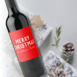 Modern Cool Classic Red Christmas Wine Label<br><div class="desc">A classic Christmas Wine Label with a vibrant red colour. Featuring bold,  modern white text that reads "Merry Christmas, " alongside a personalized handwritten name or surname of the recipient,  making it a thoughtful and unique touch for holiday gifting.</div>