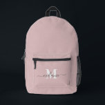 Modern Dusty Pink Custom Monogram Name Printed Backpack<br><div class="desc">Stay stylish and organized with this Modern Dusty Pink Custom Monogram Name Printed Backpack. Featuring a soft, muted dusty pink shade, this backpack offers a chic and sophisticated look, perfect for everyday use, school, work, or travel. Personalize it with your monogram or name for a unique and elegant touch. With...</div>