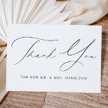 Modern Elegance Black Script Wedding Thank You Card<br><div class="desc">Elegant wedding thank you card featuring "Thank You" in a black calligraphy script with your last name displayed below. The elegant wedding thank you card reverses to display your custom thank you message and first names in black lettering. Design coordinates with our Modern Elegance wedding collection.</div>