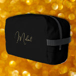 Modern Elegant Black Gold Monogram Travel Cosmetic Dopp Kit<br><div class="desc">Create your own custom, personalized, beautiful modern elegant faux gold script / typography monogram monogrammed, durable Polyester Poplin, sturdy polyester fabric mens womens kids solid plain black cosmetic makeup toiletry organizer golf beach accessory gym travel dopp kit bag pouch with a zippered closure, two interior mesh pockets - one zippered...</div>