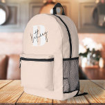 Modern Elegant Blush Pink Monogram Printed Backpack<br><div class="desc">A handwritten monogram design in an elegant style in black informal casual script typography over a blush bold pink initial oversized letter. The text can easily be customized for a design as unique as you are!</div>
