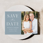 Modern Elegant Dusty Blue Photo Save The Date<br><div class="desc">Announce your wedding date with this stylish, modern photo save the date card. The design features "Save the Date" in white serif and script fonts with a dusty blue background. Personalize the minimalist save the date announcement by adding your names, date, wedding location, and photo. The card reverses to a...</div>