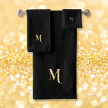 Modern Elegant Faux Gold Script Monogrammed Black Bath Towel Set<br><div class="desc">Create your own custom, personalized, modern, minimalist, cool, stylish, elegant faux gold calligraphy typography script font monogrammed initial, trendy, machine washable, bath towel set that includes 30" x 60" bath towel, 16" x 28" hand towel and 13" x 13" washcloth. To customize, simply type in your monogram / initials. Makes...</div>