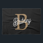 Modern Elegant Monogram Name  Black Gold Script  Kitchen Towel<br><div class="desc">The Modern Elegant Monogram Name Black Gold Script Kitchen Towel is a chic and functional accessory for any kitchen. It features a stylish black background with elegant gold script, customizable with a monogram and name, offering a personal touch. Made from high-quality, absorbent fabric, this kitchen towel is perfect for drying...</div>