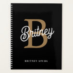 Modern Elegant Monogram Name Black Gold Script Planner<br><div class="desc">The **Modern Elegant Monogram Name Black Gold Script Notebook** is a sophisticated and personalized accessory designed for note-taking, journalling, or planning. This notebook features a sleek black cover with an elegant gold script that can be customized with a monogram and name. The combination of black and gold adds a touch...</div>
