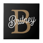 Modern Elegant Monogram Name  Black Gold Script  Tile<br><div class="desc">The Modern Elegant Monogram Name Black Gold Script Ceramic Tile is designed to add a touch of sophistication to any space. Featuring a sleek black background with elegant gold script showcasing a personalized monogram and name, this ceramic tile blends modern luxury with timeless style. Ideal for use in various settings...</div>