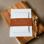 Modern Elegant Script Terracotta Wedding Invitation Belly Band<br><div class="desc">Elegant wedding invitation belly bands featuring "the wedding of" displayed in a white calligraphy script on a terracotta background. Personalize the modern wedding belly bands with your names and wedding date below in white lettering.</div>