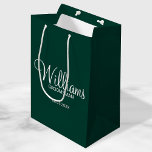 Modern Emerald Green Personalized Groomsman Medium Gift Bag<br><div class="desc">Personalized Groomsman Gifts
featuring personalized groomsman's name in white modern script font style with title and wedding date in modern sans serif font style on emerald green background.

Also perfect for best man,  father of the bride,  bridesmaid,  maid of honour,  mother of the bride and more.</div>