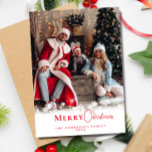 Modern Festive Red Christmas Stylish Family Photo  Holiday Card<br><div class="desc">Celebrate the season with our Modern Trendy Red Christmas Photo Holiday Card, beautifully decorated with delicate snowflakes and festive red calligraphy. This stylish card allows you to customize it with your own photo and family names, adding a personal touch to your holiday greetings. The elegant red script perfectly complements the...</div>