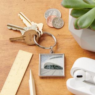 Modern futuristic white building keychain