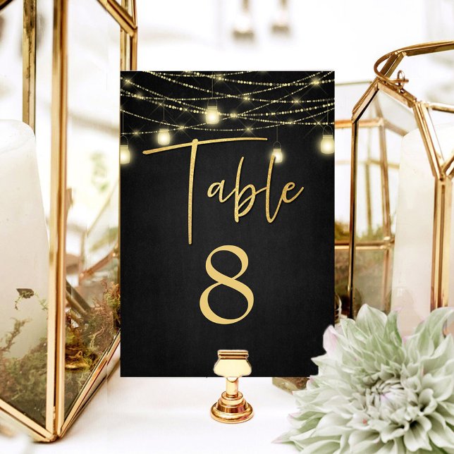 Modern Gold & Black Lights Elegant Script Table Number (Creator Uploaded)