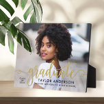 Modern Gold Script Graduate Photo Graduation Plaque<br><div class="desc">Stylish and elegant graduation plaque sign with easel features a senior photo with "graduate" faux gold foil script overlay. Personalize the modern custom text with your grad's name,  school,  and class year. Makes a beautiful keepsake to display in your home!</div>