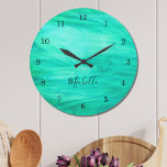 Modern Green Large Clock<br><div class="desc">This colourful Wall Clock is decorated with a green swirl pattern.
Easily customizable with your name or monogram.
Use the Customize Further option to change the text size, style or colour if you wish.</div>