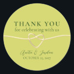 Modern Green Wedding Thank You Classic Round Sticker<br><div class="desc">Presenting our chic wedding thank you stickers, a stylish blend of modern minimalism and vibrant elegance. Radiating with the fresh and lively hue of green, these stickers add a pop of colour to your favours, while exuding a sense of contemporary sophistication. Embellished with a radiant gold rope heart, symbolizing the...</div>