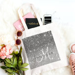 Modern Grey Glitter Sparkles Personalized Name Tote Bag<br><div class="desc">Introducing the exquisite Modern Grey Glitter Sparkles with Personalized Name product, a stunning combination of contemporary design and personalized elegance. This product features a captivating backdrop in a modern shade of grey, exuding sophistication and style. The subdued yet chic colour sets the stage for the mesmerizing sparkle of glitter, which...</div>