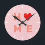 Modern Home Heart on Pink Round Clock<br><div class="desc">Modern home heart on pink background Wall Round Clock.</div>