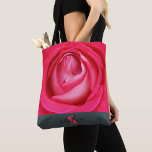Modern hot pink rose with name  tote bag<br><div class="desc">Looking for a beautiful present for your favourite queen? Look no further than this tote bag that's all about pink power and romance! The hot-pink rose design is breathtaking, and the best part? You can add your pal's name and monogram to make it a one-of-a-kind piece! Women will love it!...</div>